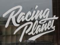Shop Racing Planet Scooter Branded Merchandise and Decals - Sticker sticker Racing Planet 200x115mm in white